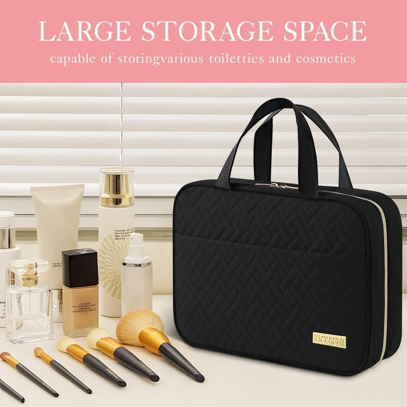 Black quilted hanging toiletry bag beside makeup brushes and skincare bottles showing its large storage space