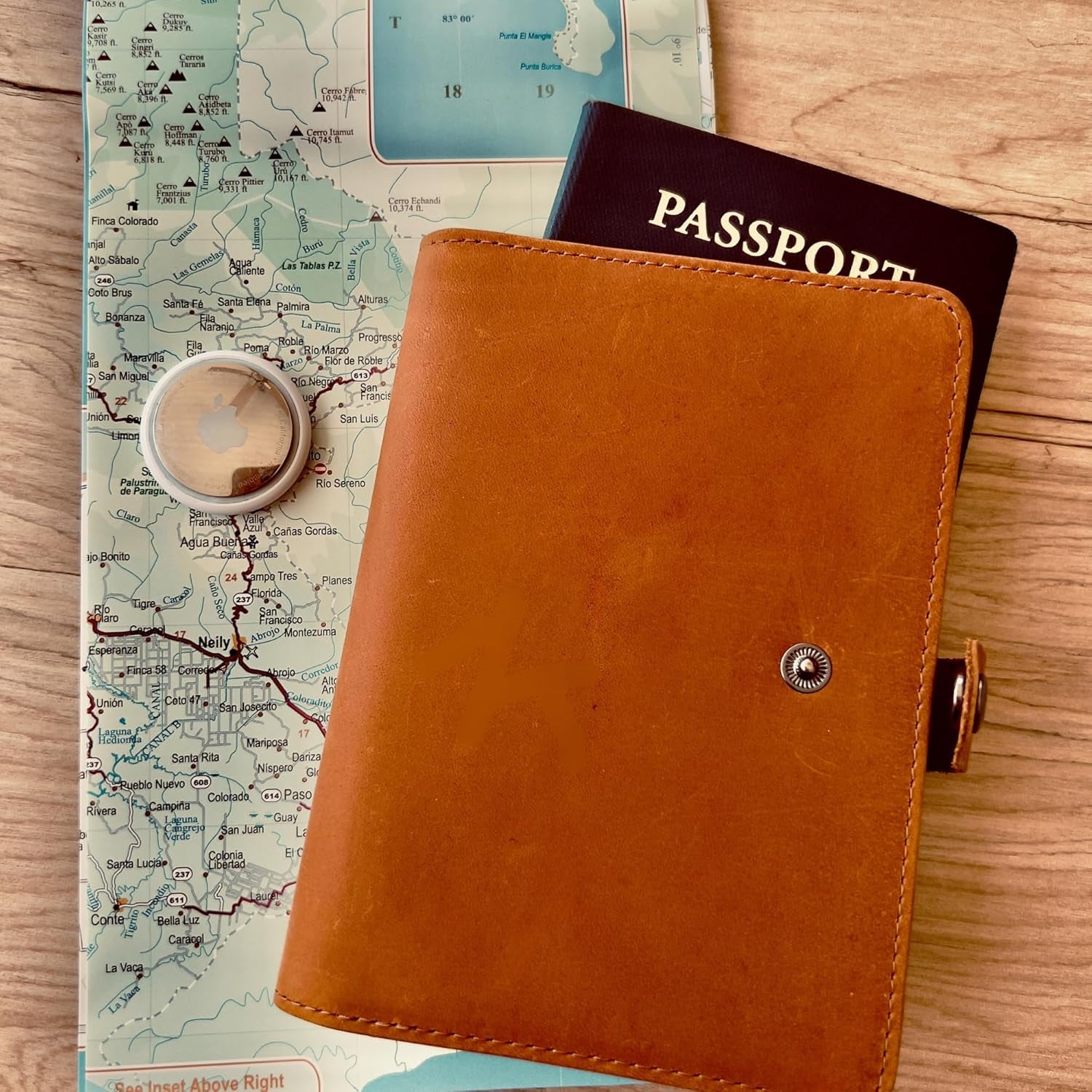 Genuine Leather AirTag Passport Holder with RFID Blocking for Secure Travel - Abbycart